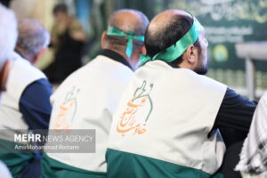 احترام نظامی خادمیاران رضوی کرمانشاه به سرود ملی