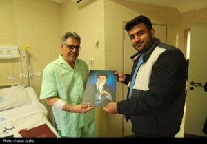 فداکاری مدیر زنجانی در دل آتش و آوار حسینیه اعظم زنجان